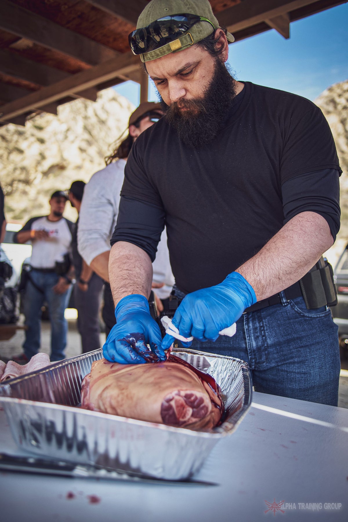 A student packing a wound during Tactical Field Care